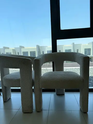 2 designer chairs light beige