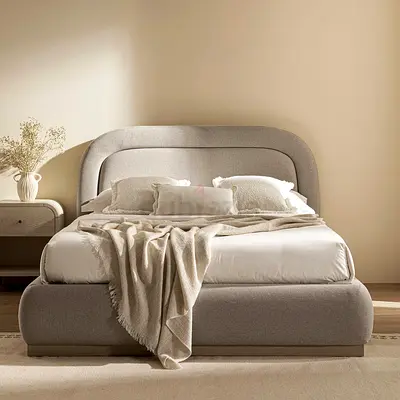 Curved fully padded queen bed frame