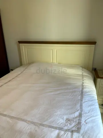 Wooden King bed  - Cream and Oak Finish- chest of drawers , 2 bed side tables , mirror and shelves .