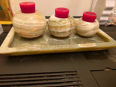 Natural handmade marble onyx tray with three marble candle holders.
