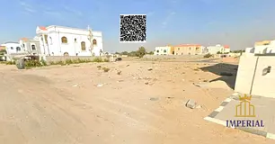 Residential land for villas (G+1), freehold in Al Rawda 1, Ajman, second plot off Riyadh Street