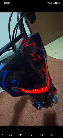 Used electric scooter — working lights, no rear wheels and seat,