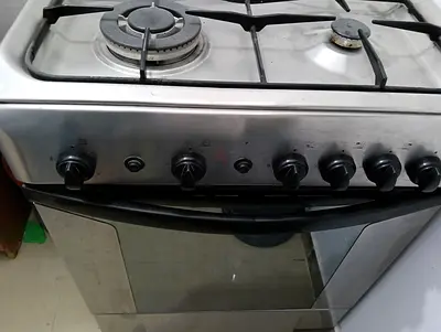 Used freestanding gas stove with oven - 4 burners, stainless steel