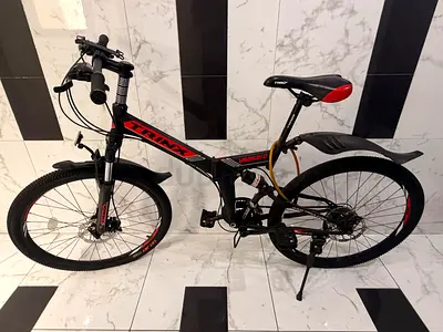 Trinx Mountain Bike - Full Suspension, 26 Wheels, Good Condition