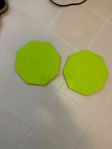 Pair of green core sliders / gliding discs for home workouts