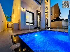 Villa for sale opposite a garden, including registration fees, electricity, water and air conditioni