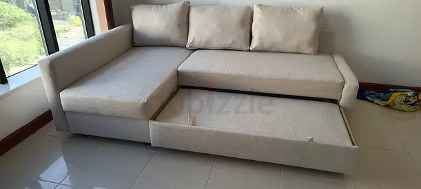 Light Beige L-shaped Sofa with Storage — Good Condition