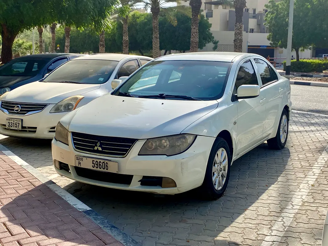 Mitsubishi Lancer 2014 — photo 1 of 15