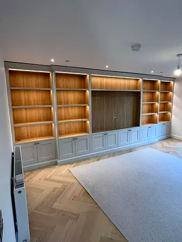 Custom Built-in Wall Bookcase with Display Shelves and Cabinet Storage