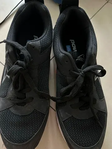 Black casual sneakers, lightly used - size not specified