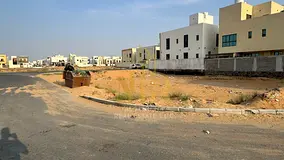 Prime Residential Investment Land for Sale in Al Amerah Ajman Strategic Location Second Plot from Ma