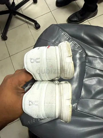 Used white childrens sneakers (size not specified) - pair