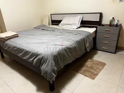 Queen bed set with mattress and matching bedside drawer - dark wood