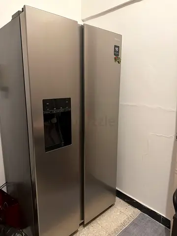 Large stainless steel double-door refrigerator with water dispenser - excellent condition