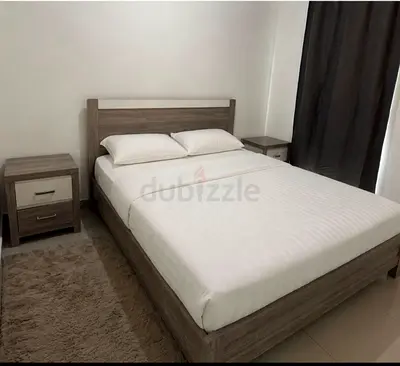 Used Queen Bed Frame with Two Matching Nightstands - Grey Wood Finish
