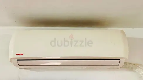Used Nikai wall-mounted split air conditioner - good working condition