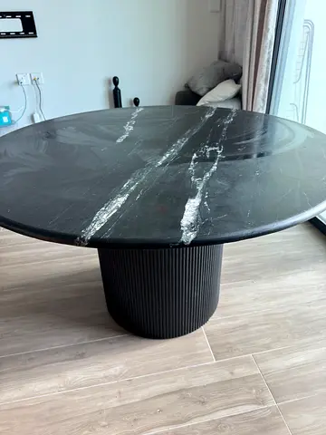 Round Black Marble-Top Dining Table with Ribbed Pedestal Base