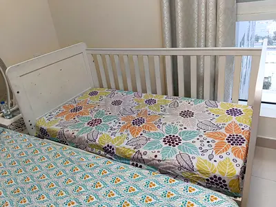 White wooden baby crib/ Side Bed