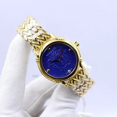 Versace womens gold-tone Master Copy watch with blue Medusa dial - elegant bracelet style