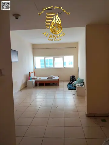 Studio apartment for annual rent in Ajman One, with swimming pool, gym, and parking.