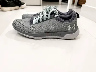 Light grey casual lace-up sneakers, gently used size 38.5 underarmour