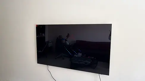 65 Wall-Mounted Smart LED TV - Good Condition