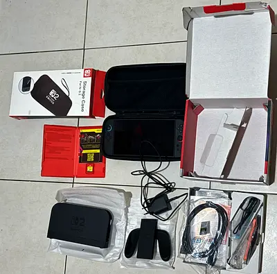 Nintendo Switch 2 in box with dock, controllers, case and accessories - new (used 2-3 times only)