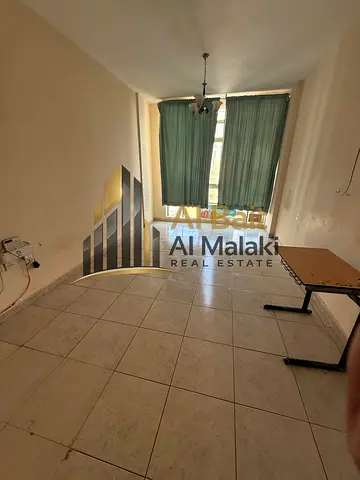 A room and a lounge in Al Qasimia with a large area and an open view
