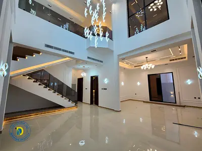 Modern corner villa with 5 bedrooms, registration fees included, in Al-Helio 1 area. Freehold. Bank financing available.