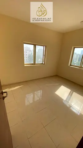 Two bedrooms, a living room, two bathrooms, and a balcony. Located in Al Rashidiya 2, next to Falcon Towers. Annual rent: 32,000 AED. Payment options: