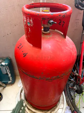Heavy-duty red gas cylinder (used) Medium size empty.