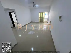 Annual 1BR hall for rent in Al Rawda 2 Ajman Balcony facing the street 1 bathroom near Dubai exit pa