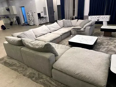 Modular pianca feather filled sofa with footstool