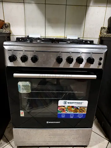 Less Used 4-Burner Gas Stove with Oven (not used) - Stainless Steel
