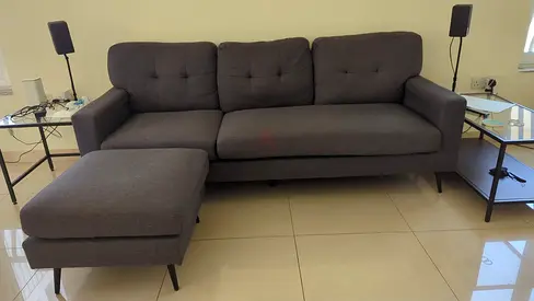 3 seater, L shaped convertible grey fabric sofa - modern, good condition with charging port