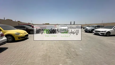 YARD FOR RENT IN AL SAJJA, SHARJAH | ROAD FACING | FULLY INTERLOCKED | NEAR CAR MARKET