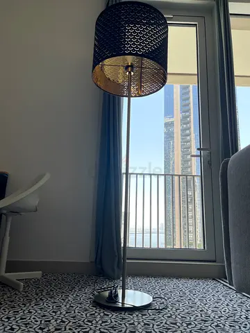 Black patterned floor lamp with metal base