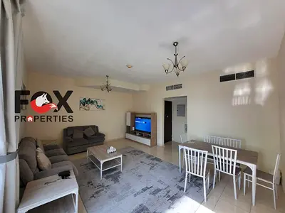 Furnished 2BR apartment for annual rent in Ajman, Orient Towers. Sea view balcony, free gym, pool & parking, prime location.
