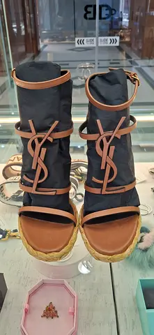 Black and tan Y-shaped lace-up espadrille sandals — size not marked