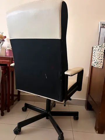 Black and white office office chair with armrests — good condition