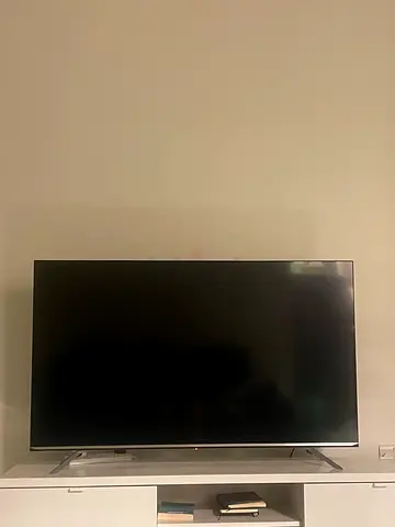 55-inch LED TV in good working condition (stand included)