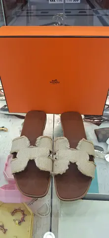 Hermès-style womens leather sandals with woven H detail (preowned)