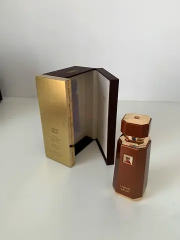 Unused Liquid Brun perfume with box - near new