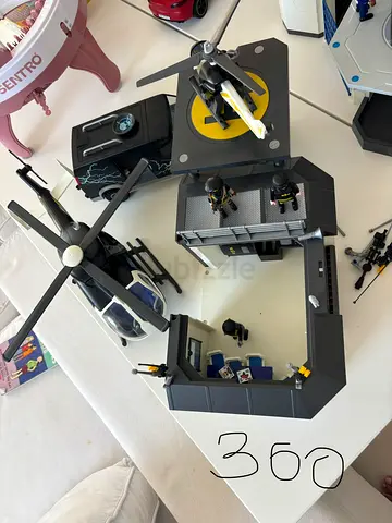 Playmobil-style military base set with helicopter and figures