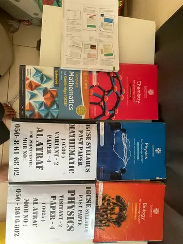 Yr 10 and 11 book for sale used with couple of half used past paper books