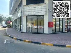 Commercial space for annual rent in Al Rashidiya 1, Ajman | Brand new, corner unit in a prime locati
