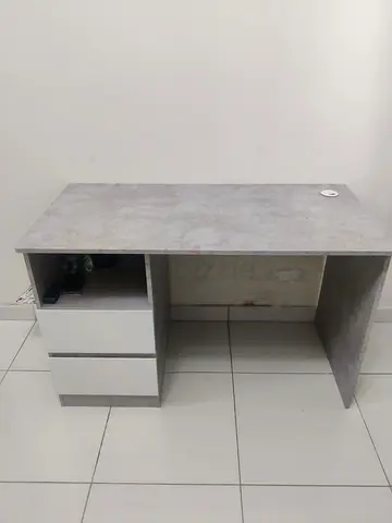 Used grey office computer desk with drawers — compact work desk