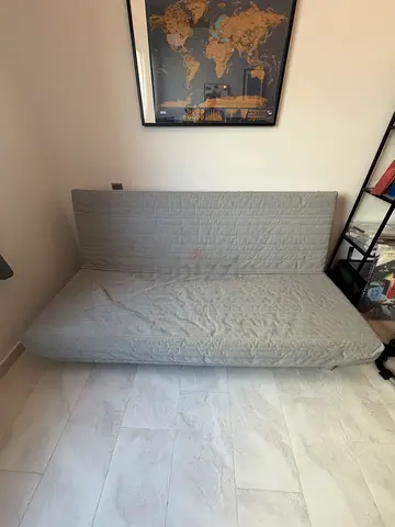 Grey sofa bed / futon in good condition from Jysk