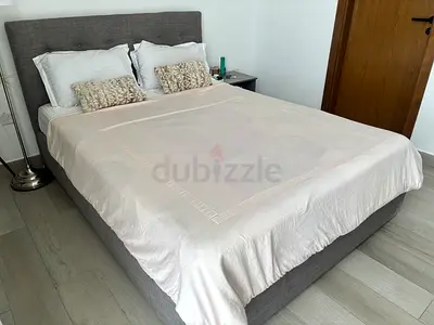 Bed and mattress with side table for sale