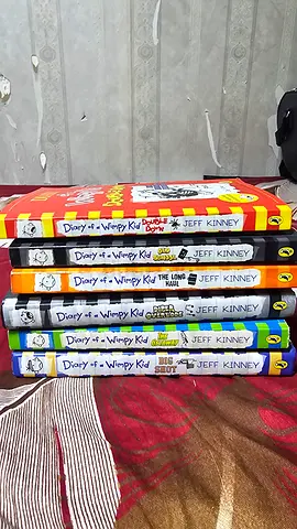 Diary of a Wimpy Kid books (multiple volumes) - used